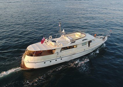 Popular event charter on a high-quality motor vessel with ageless nautical elements.