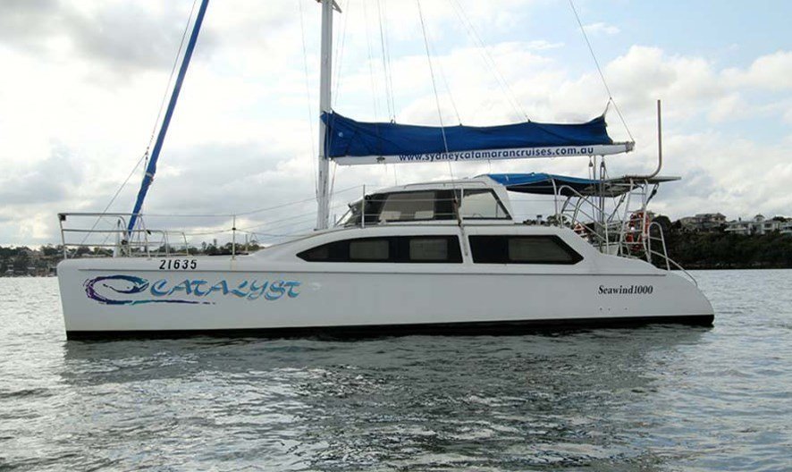 Photogenic Sydney charter boat hire on a modern sheltered catamran with sailing & BBQ options