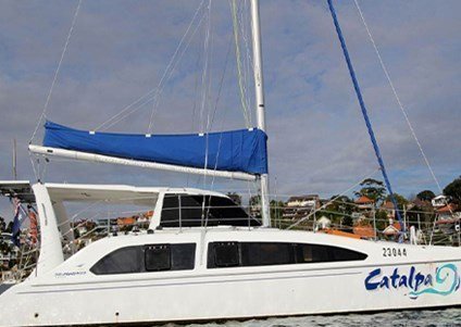 Catamaran boat hire on Sydney Harbour offering a spacious dining saloon, quality sound system and more