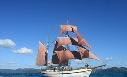 Unique boat rental in Sydney featuring the authentic tall ship, Coral Trekker